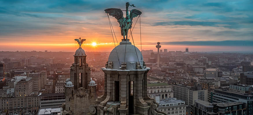 Liver Birds with a sunset